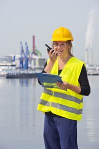 Female using two way radio
